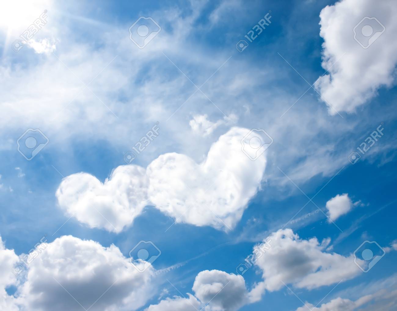 79374850-heart-white-clouds-on-blue-sky-love-abstract-background-romantic-air-design-concept.jpg